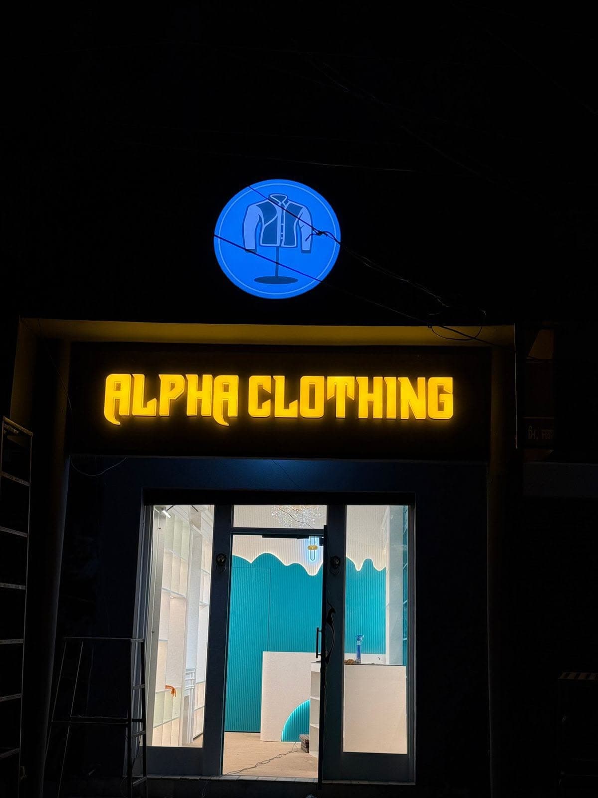 Alpha Clothing acrylic 3D glow sign board made by Pen to Print Advertisers, Patran